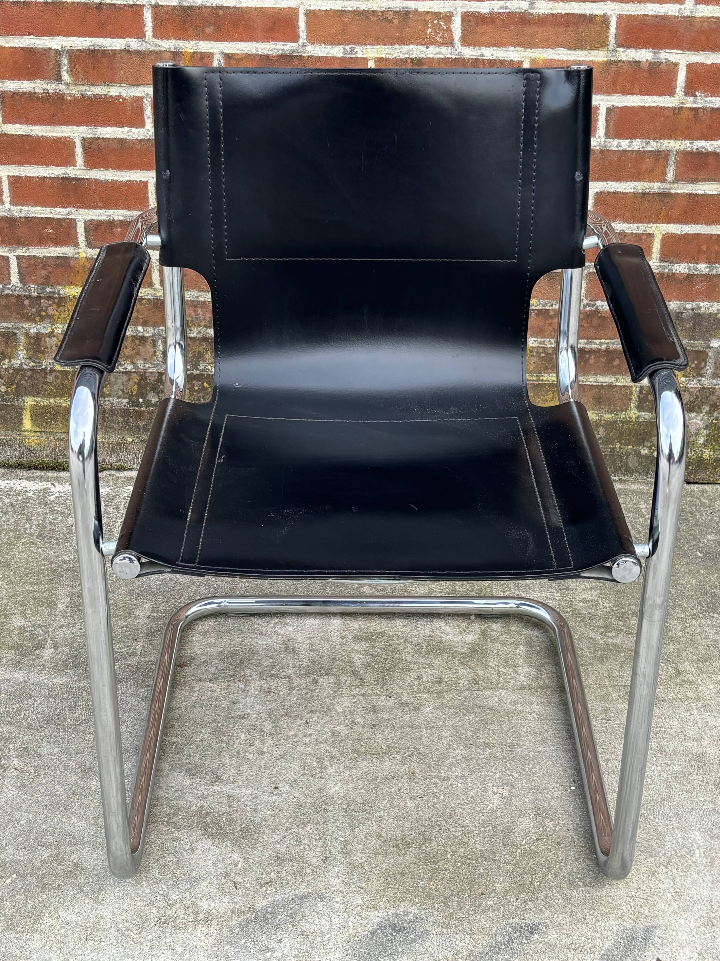 Set of 4 design cantilever chairs black and chrome design made in Italy
