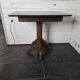 Old pedestal table with oak legs and marble top