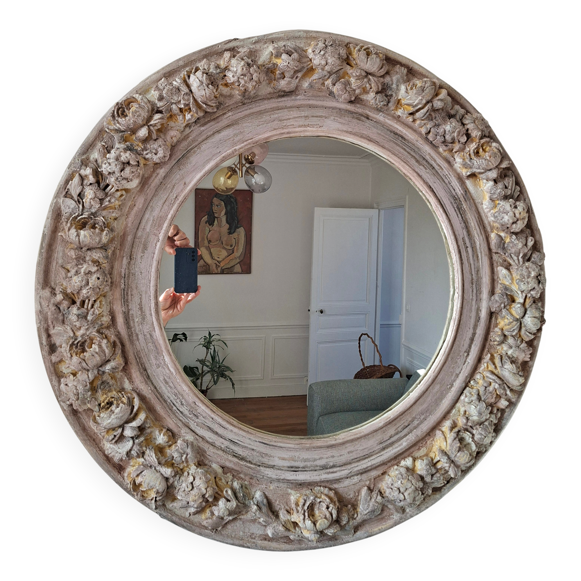 Round mirror with floral patterns
