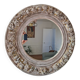 Round mirror with floral patterns