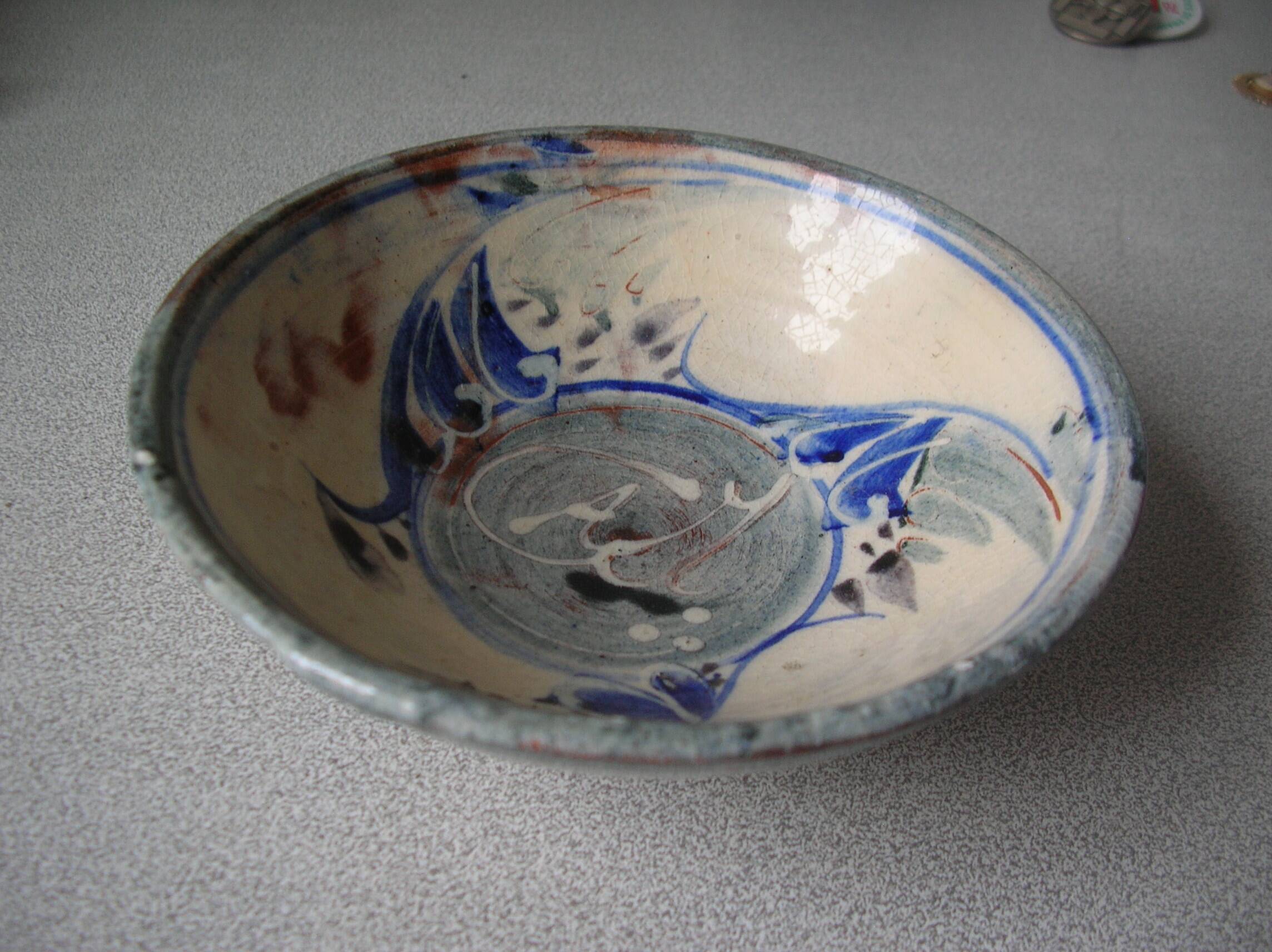 Old small bowl in enamelled terracotta, old earthenware