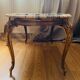 Coffee table with bronze base and marble top, Louis XV style, 20th century
