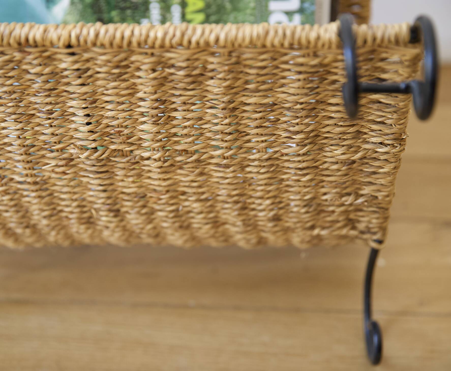 wicker and wrought iron magazine rack