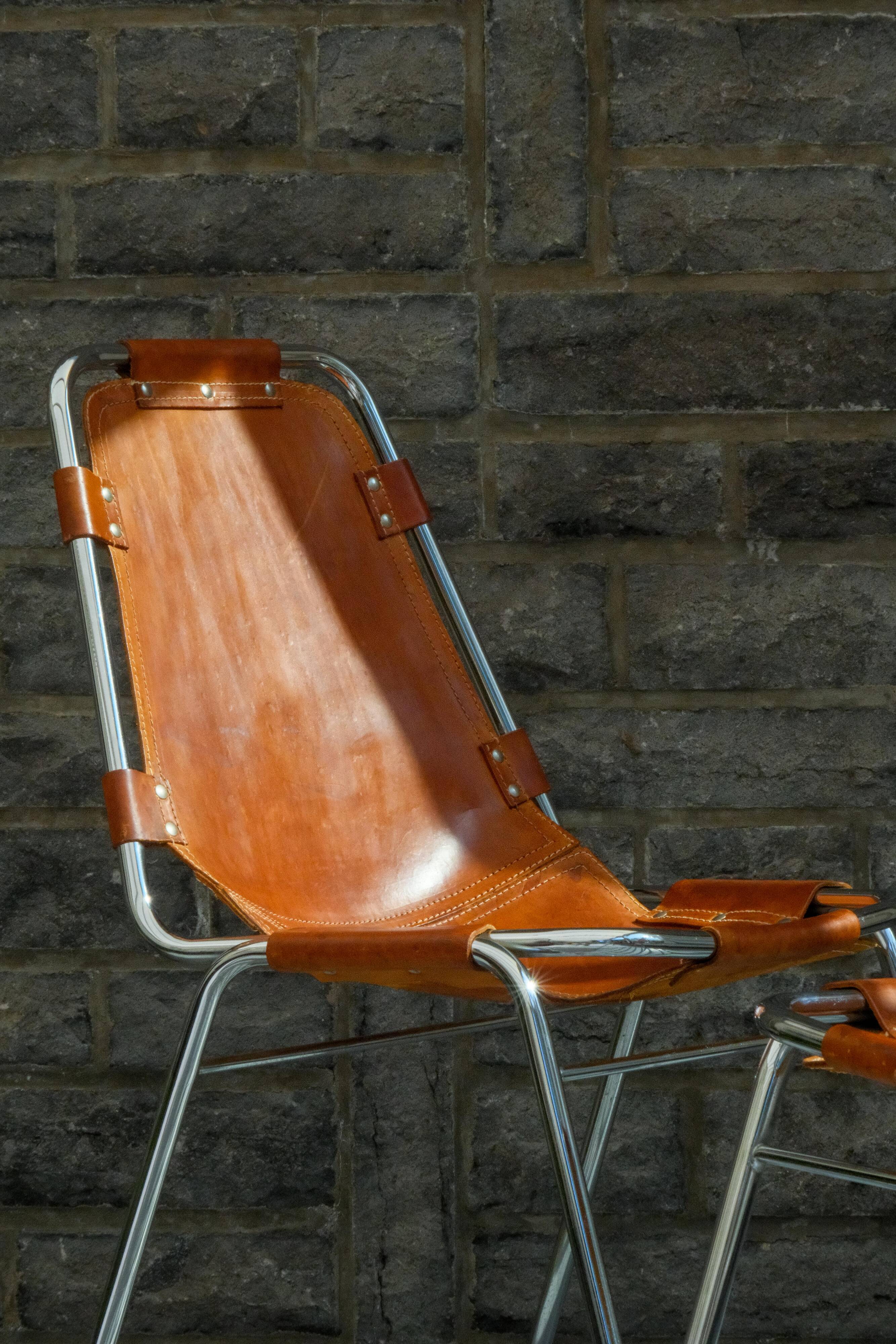 Chair Les Arcs Charlotte Perriand – Vintage patinated leather from the 60s/70s