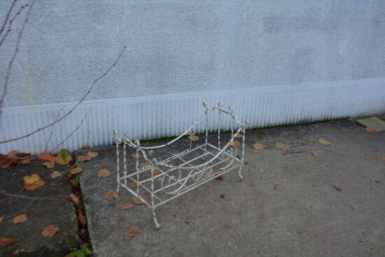 Wrought iron doll bed