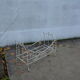 Wrought iron doll bed