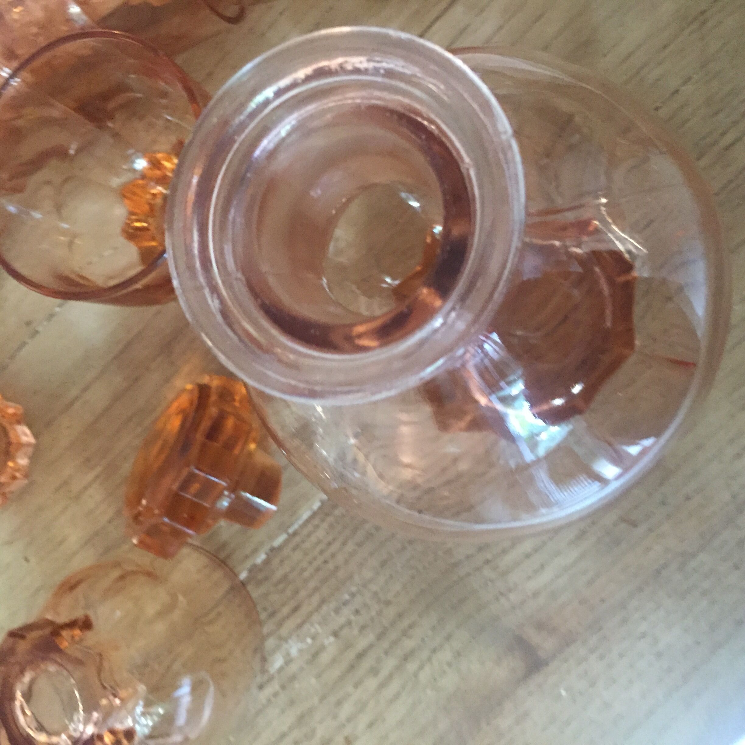 11 pink glasses and carafe