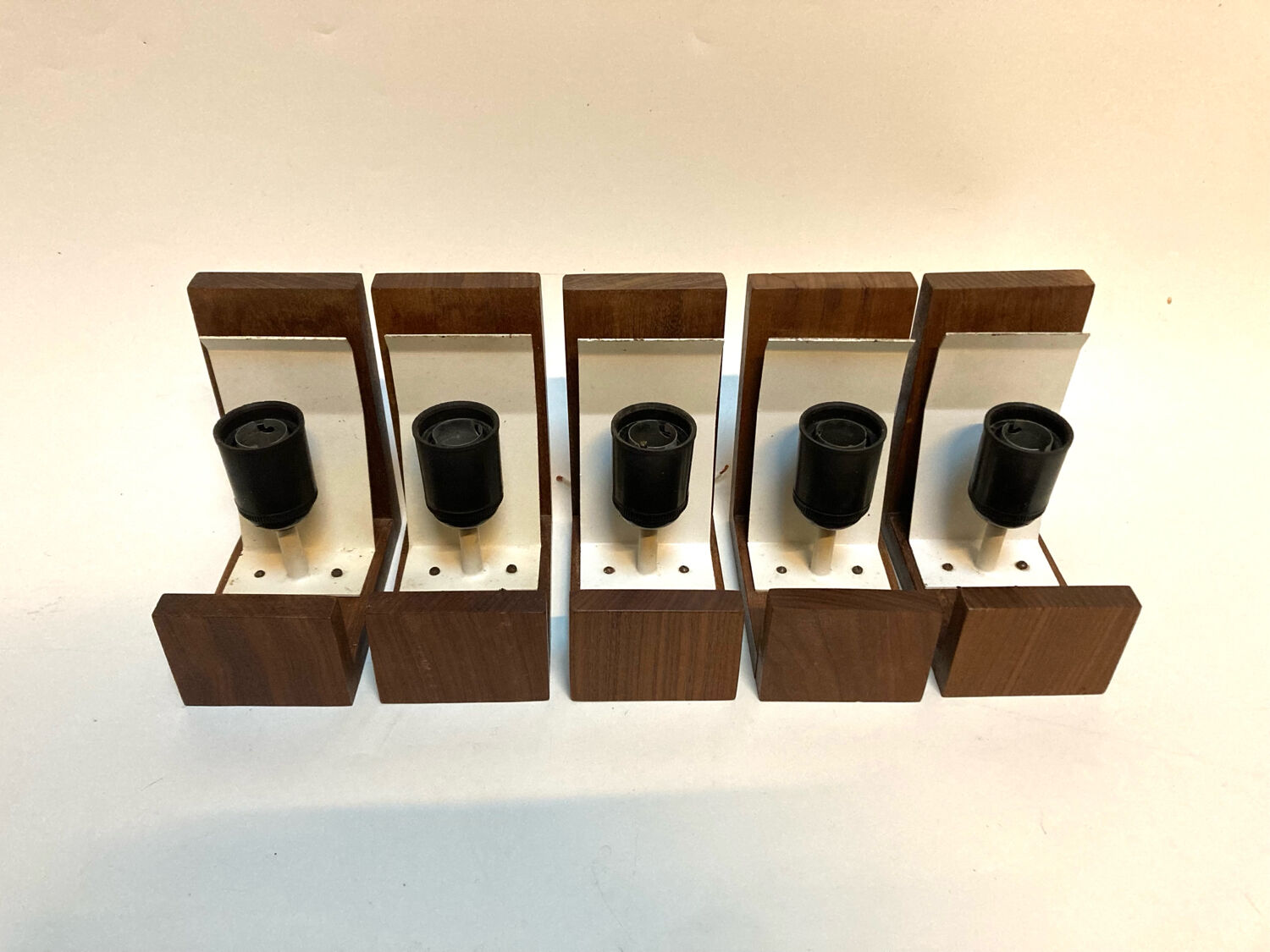 Many Louis Kallf wall lights.