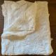 White cotton tablecloth with crochet lace.