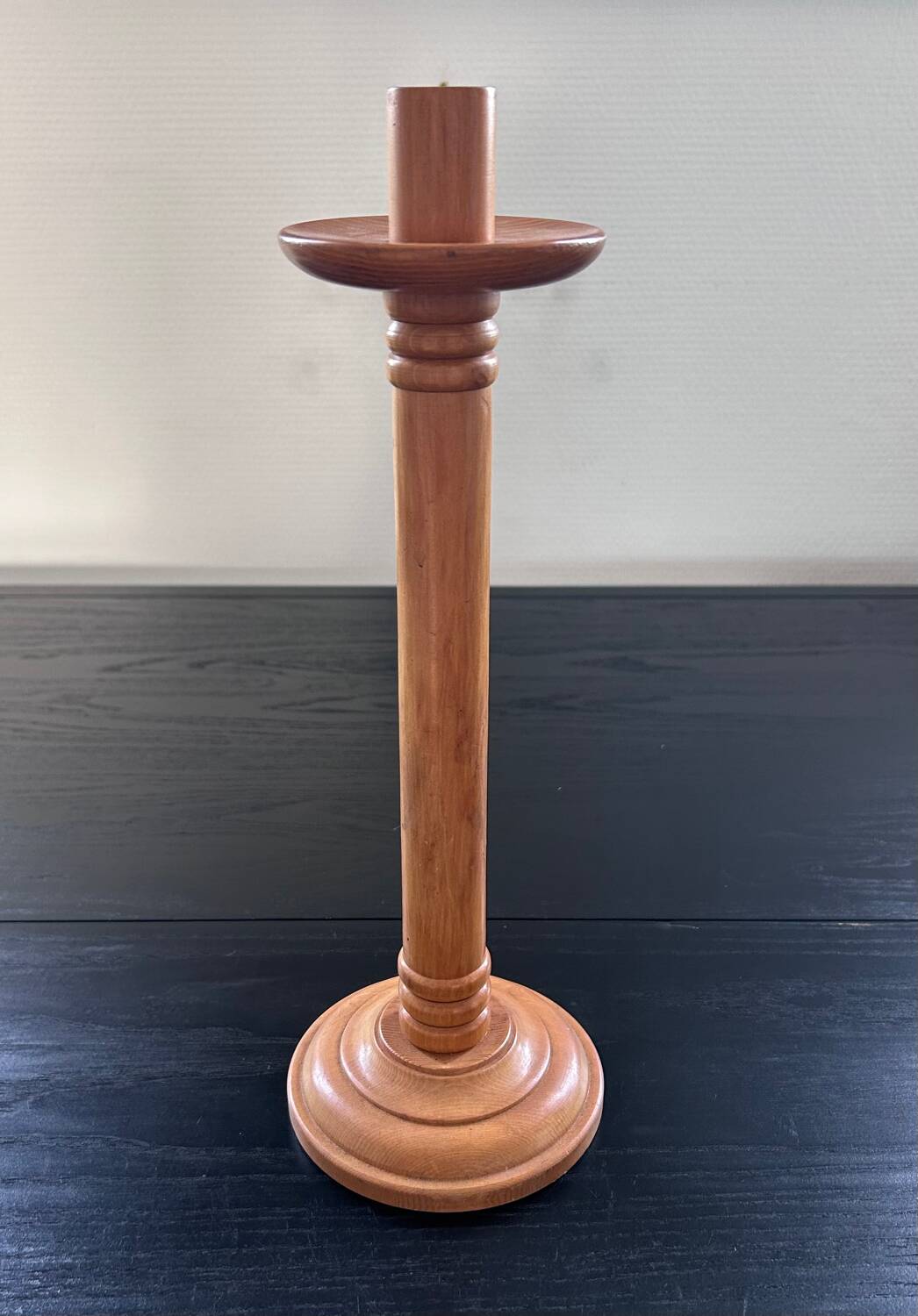 Blond wooden candle holder