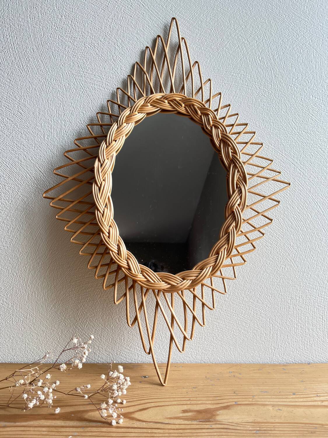 Vintage rattan mirror in star/diamond shape