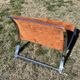 Chrome steel armchair and orange fabric by Vittorio Introini