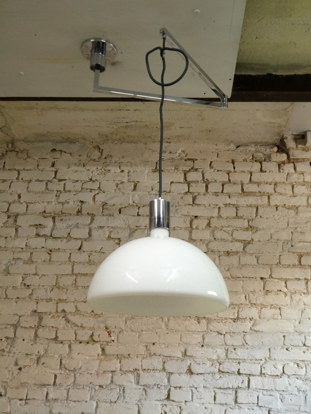 Franco Albini's articulated hanging lamp for Sirrah