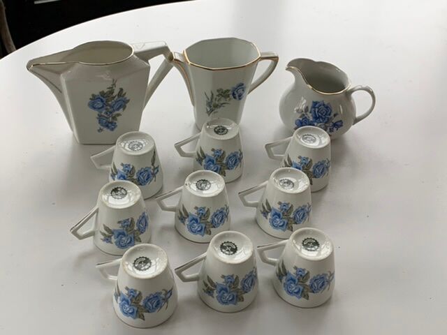 Coffee service in white porcelain pattern pink blue art deco