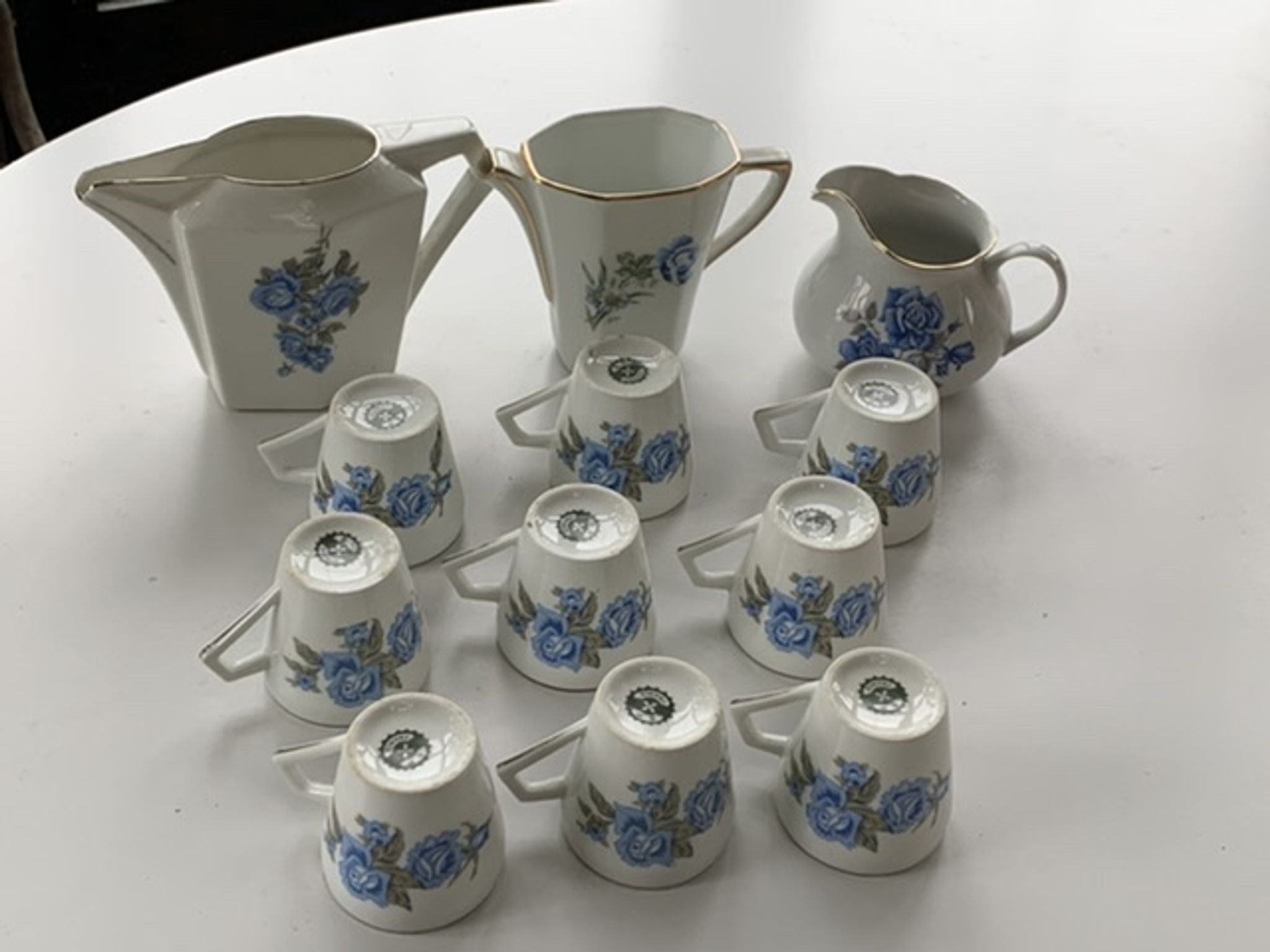Coffee service in white porcelain pattern pink blue art deco