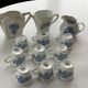 Coffee service in white porcelain pattern pink blue art deco