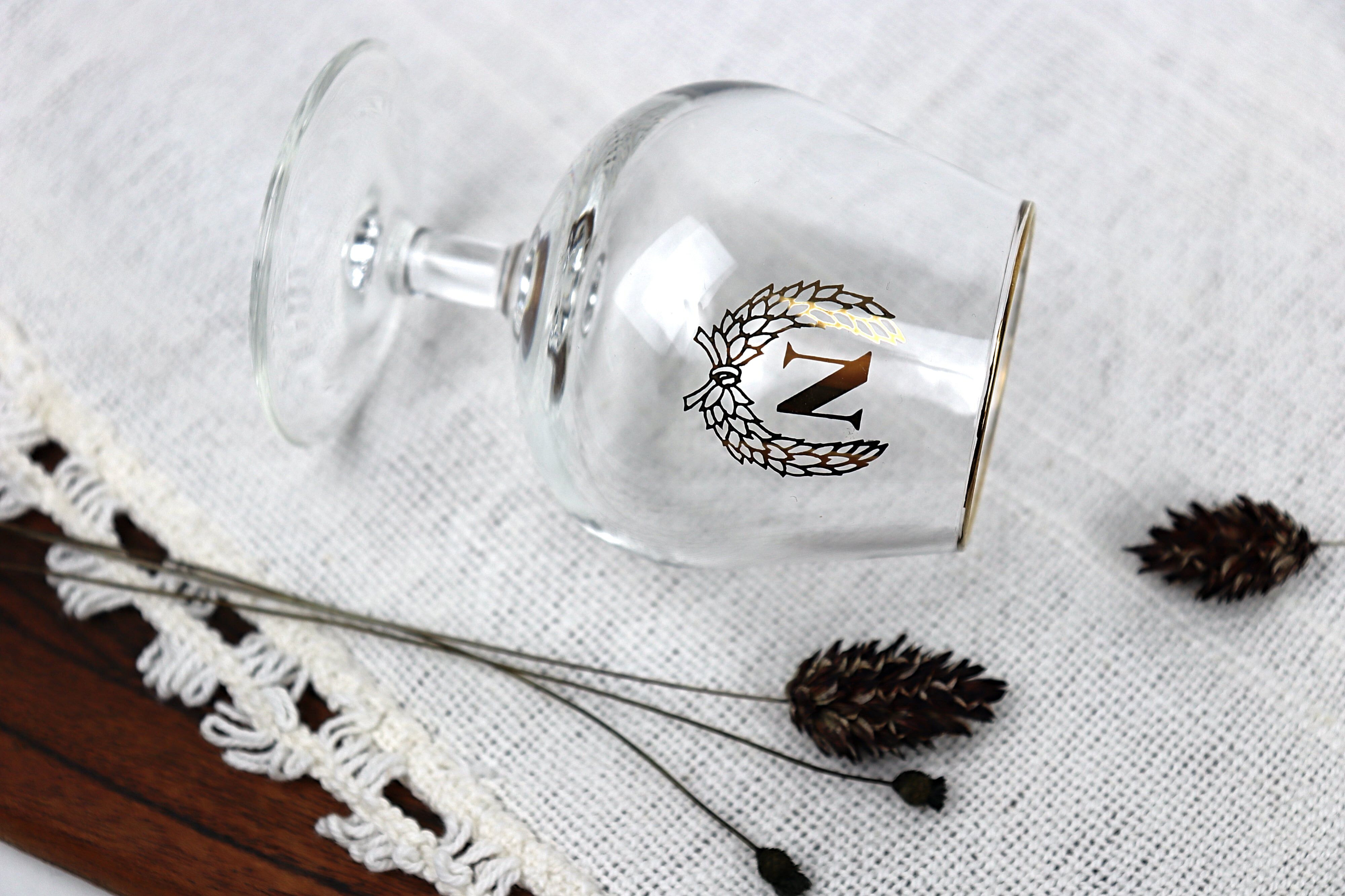 6 glasses with digestive "N"