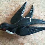 Three old wooden wall swallows