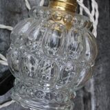 Moulded glass globe hand lamp