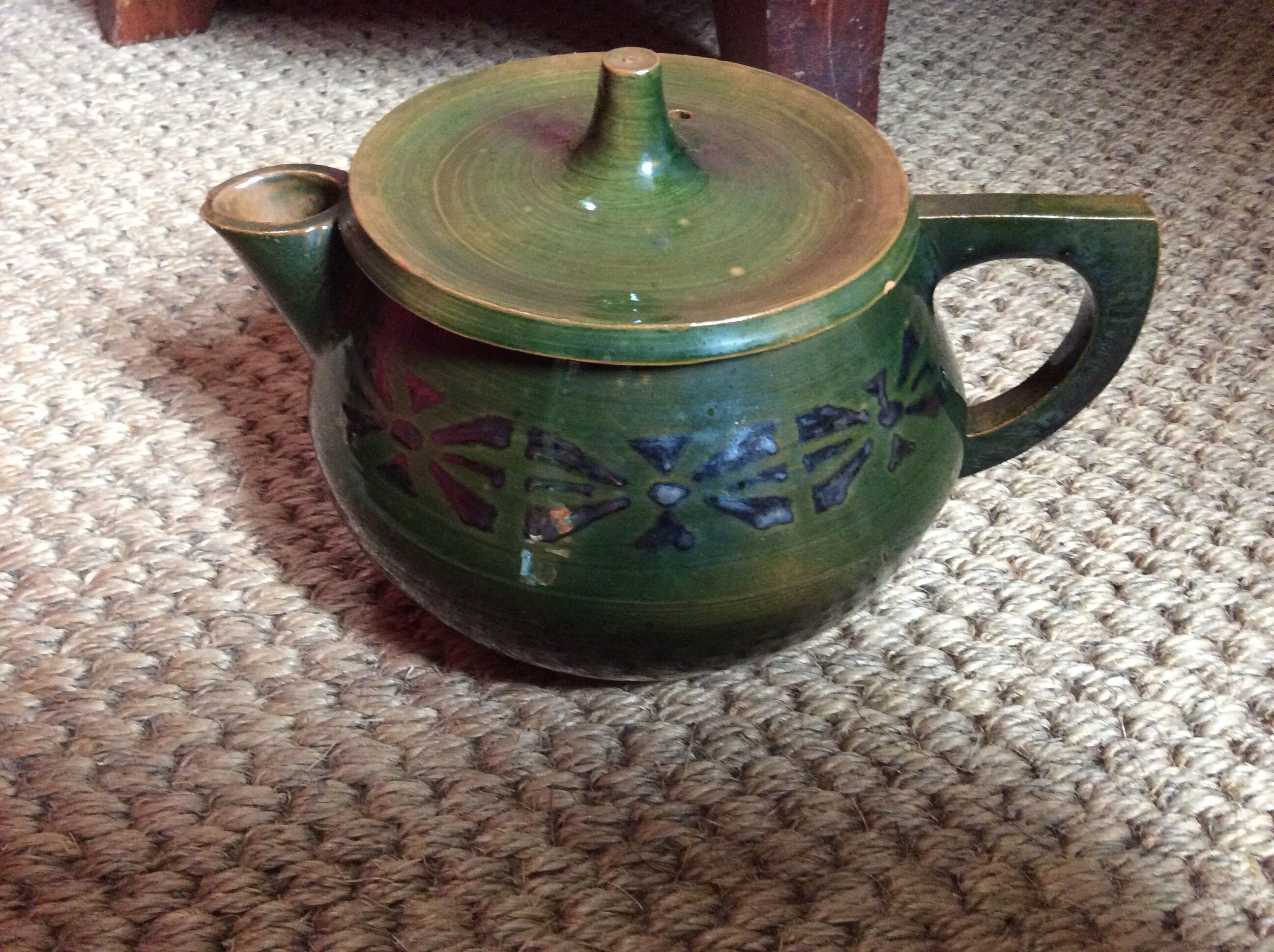 Glazed terracotta teapot