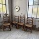 Set of 4 oak and straw chairs Dudouyt 1940