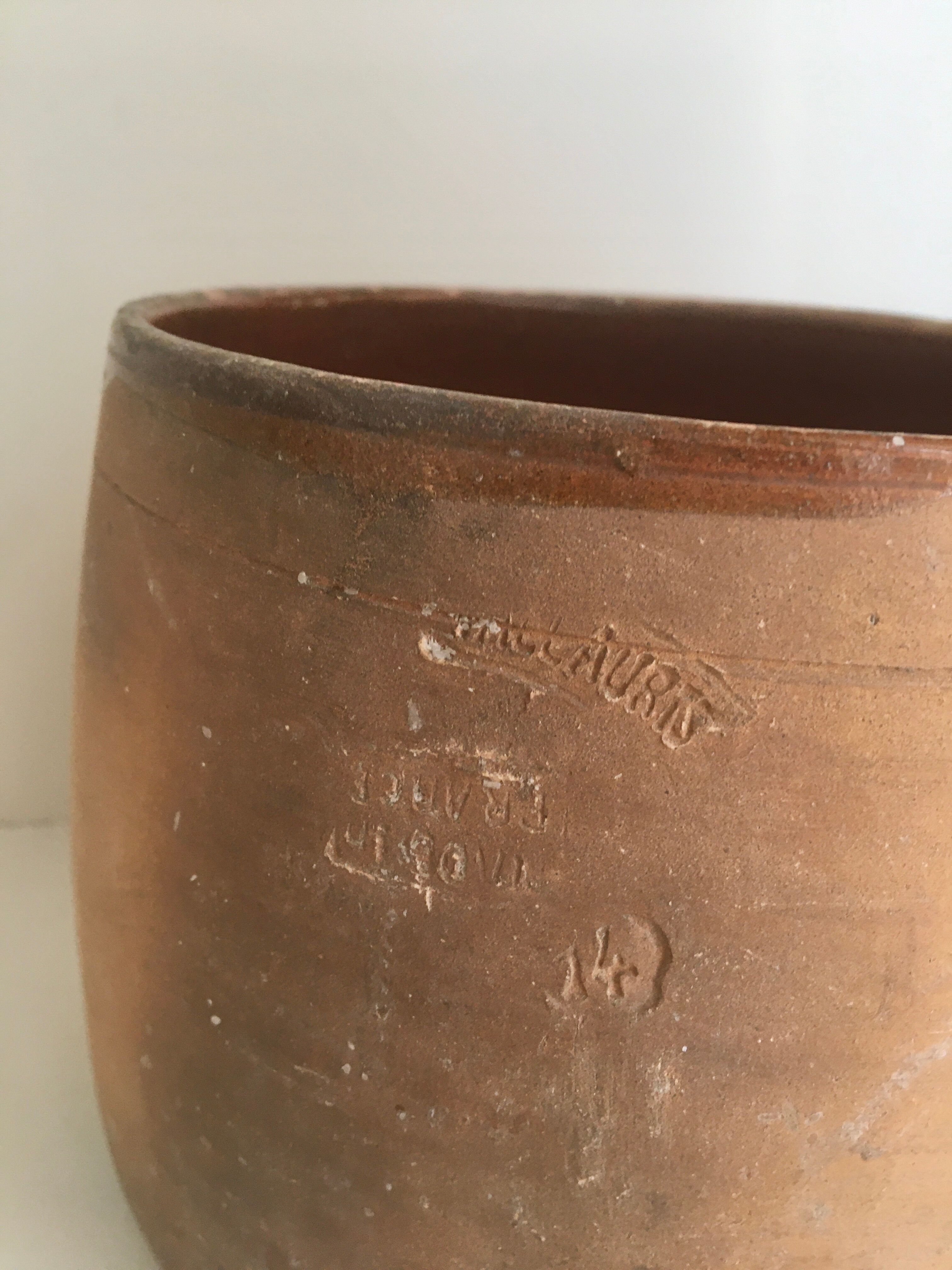 Terracotta marmite and enamelled interior