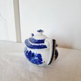 Small porcelain teapot or milk jug with the famous blue willow or weeping pattern