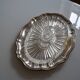 Silver-plated metal aperitif serving tray with HKE hallmark and glass.