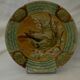 Slop bowl with bird decoration.