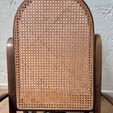 Curved wooden rocking chair