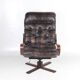 Vintage wooden and leather armchair
