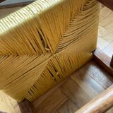 Low chair in wood and woven straw