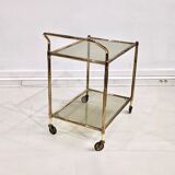 Golden metal dessert with tinted glass tops