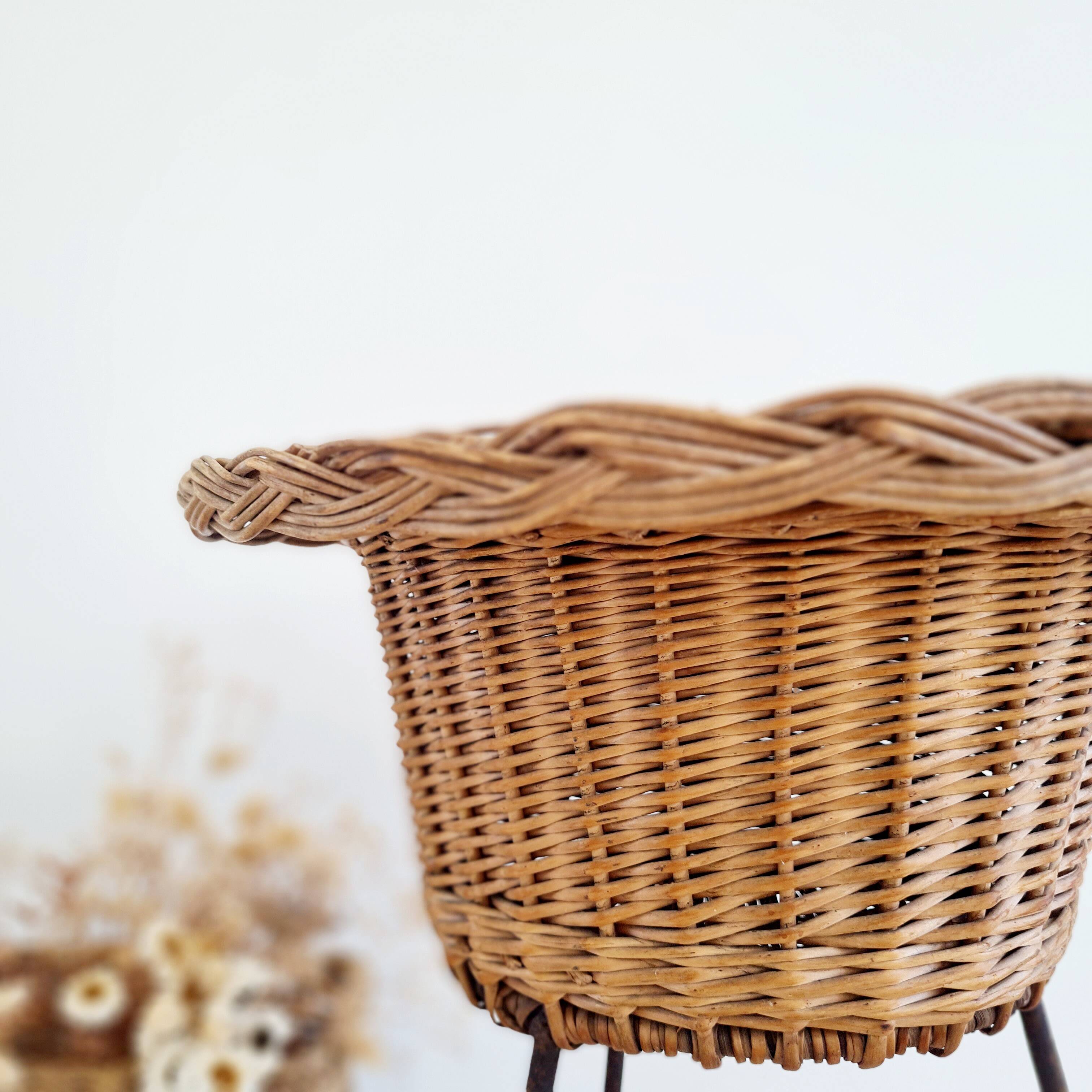 Rattan and metal tripod planter