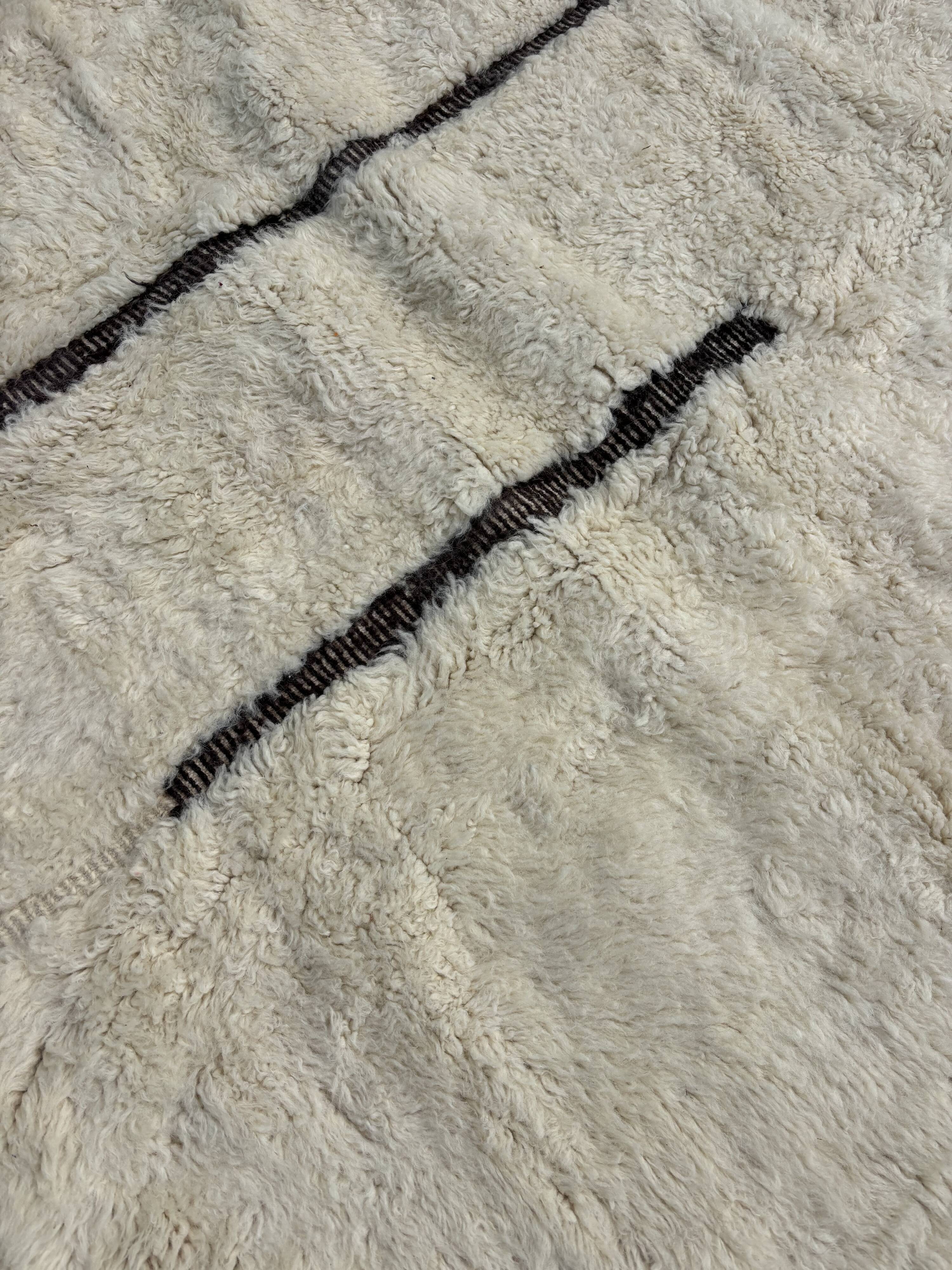 Large Berber M'rirt rug in cream and black wool, Moroccan rug.