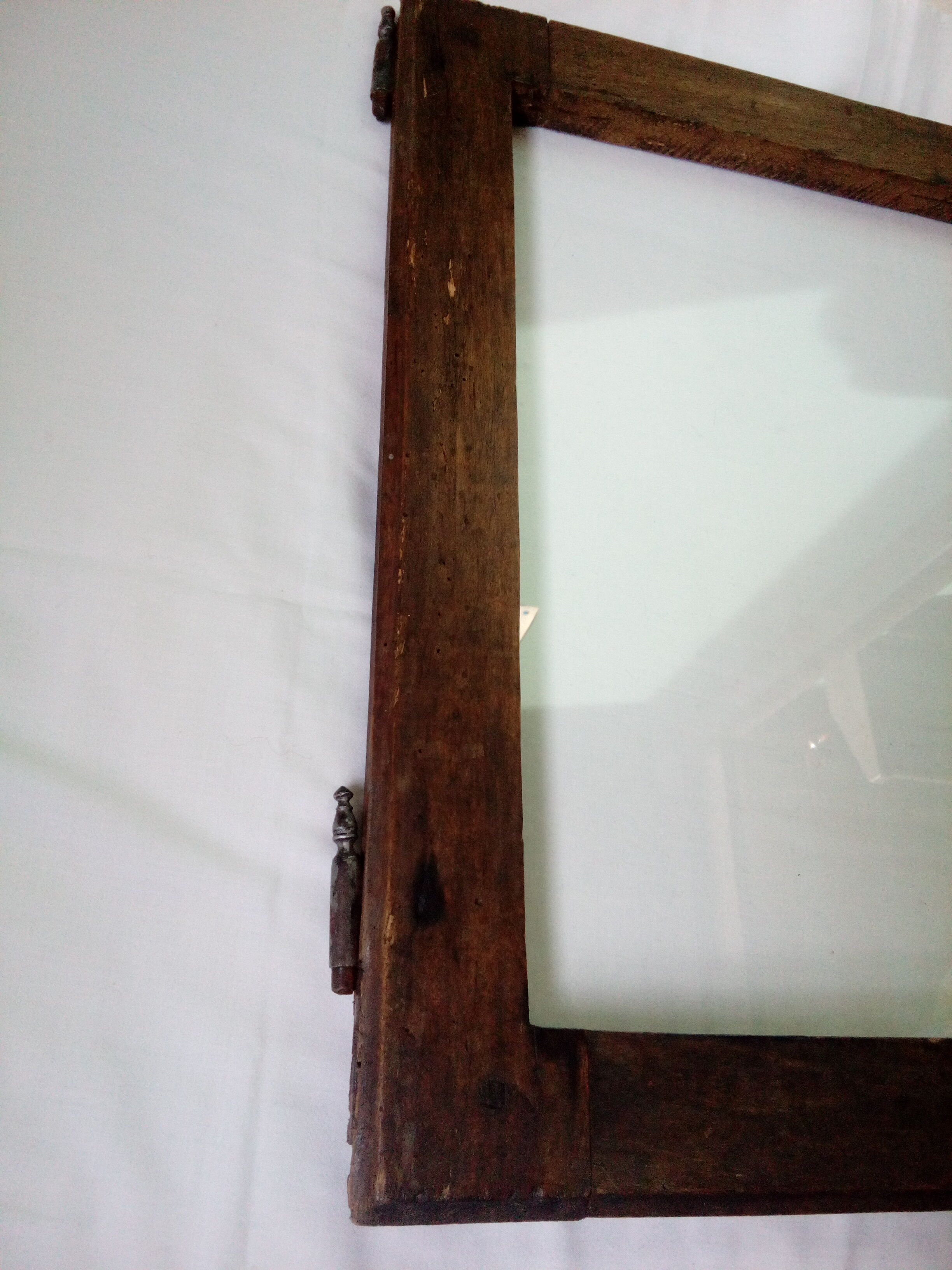 Wooden glass door with iron latch