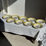 Set of 9 large vintage yellow deep plates with pink flowers and a gold rim.