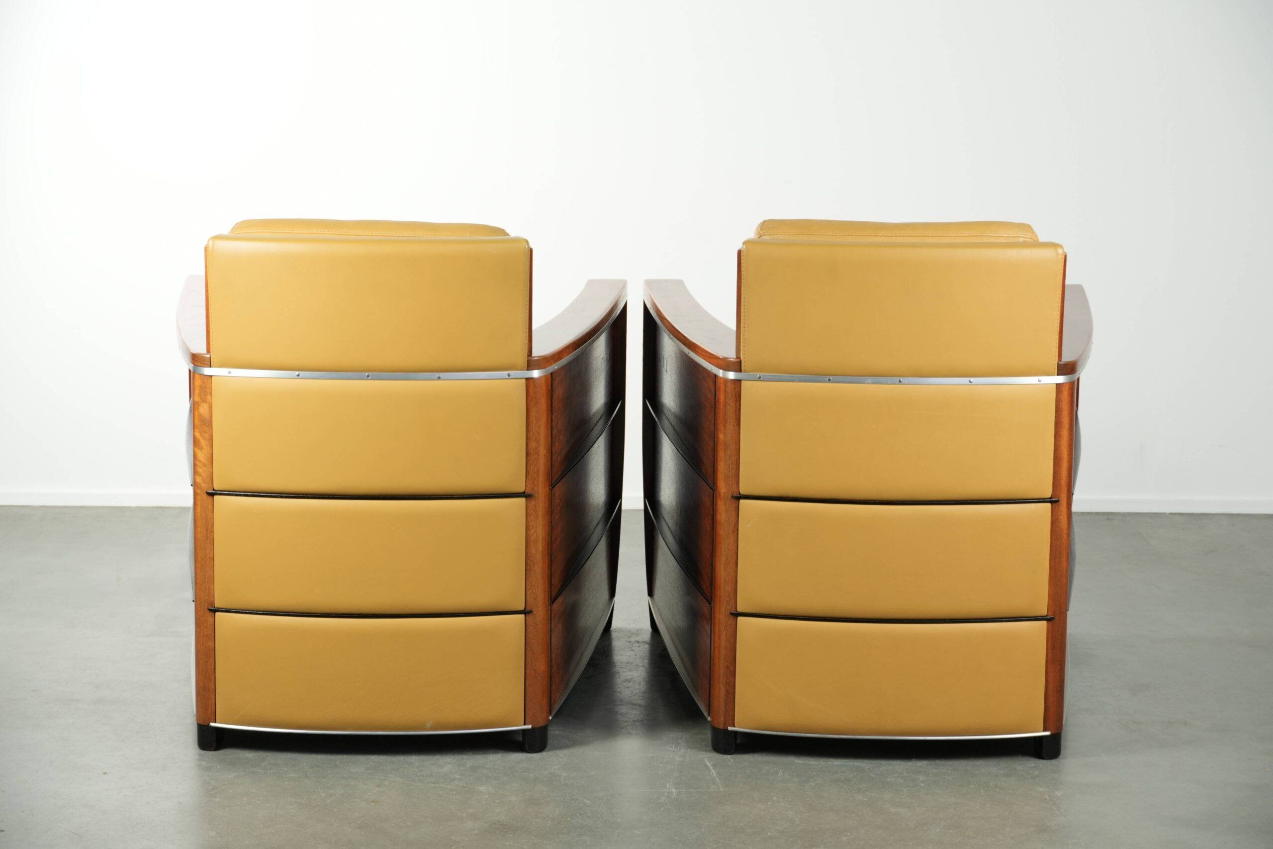 Set of two beautiful yellow cowhide Art Deco design armchairs