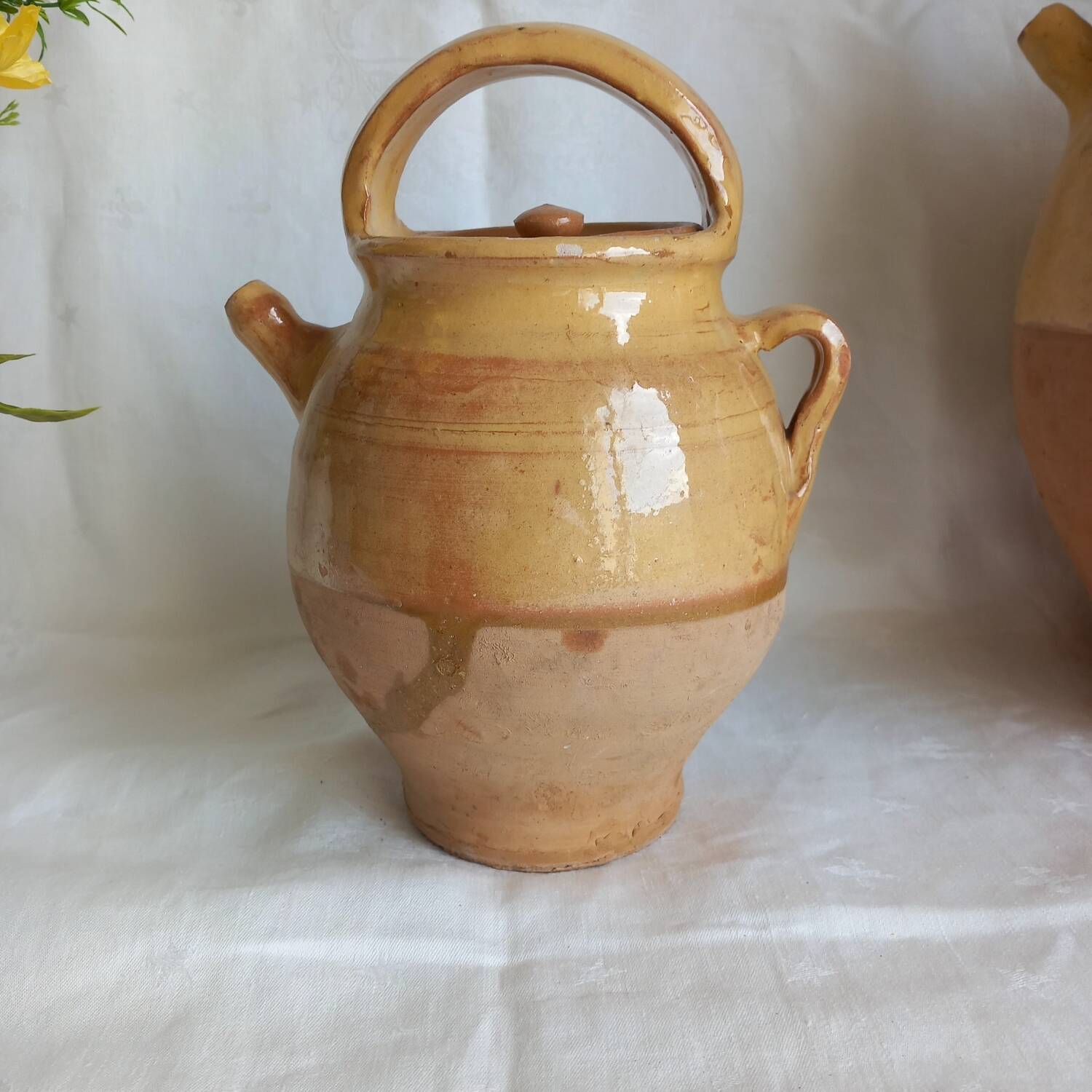 Jug, small terracotta pitcher with yellow glaze