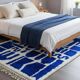Handwoven Moroccan rug, natural wool, 250cm x 150cm, elegant decoration.