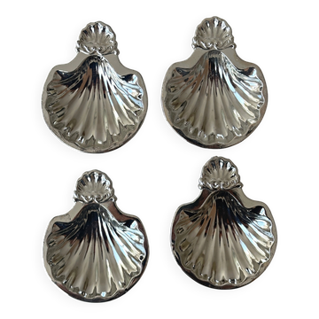 Set of 4 mini shell-shaped bowls in lightweight metal.