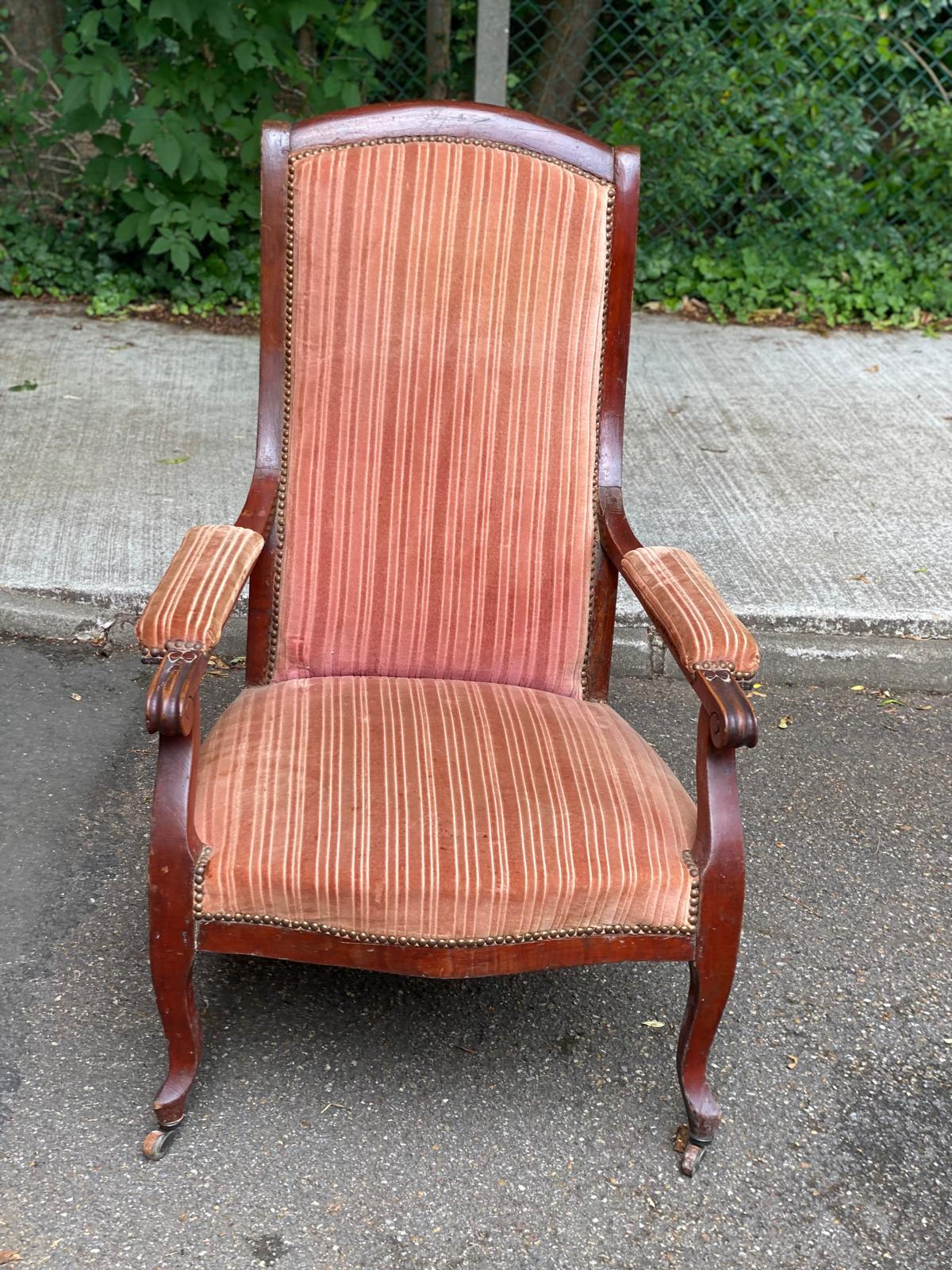 Louis Philippe Voltaire armchair from the 19th century in solid mahogany.