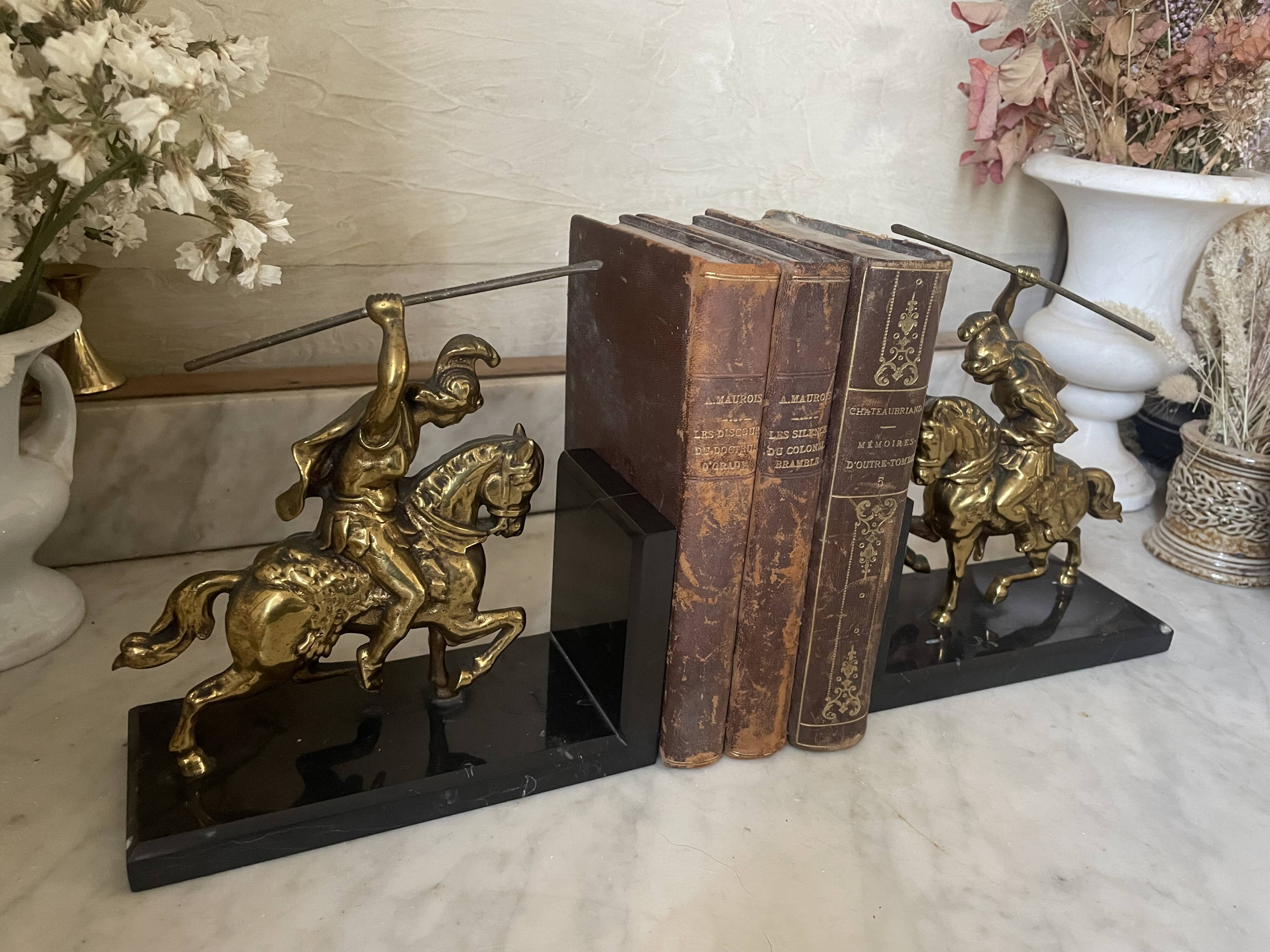 Pair of neo-classical Roman soldier bookends in marble and brass.