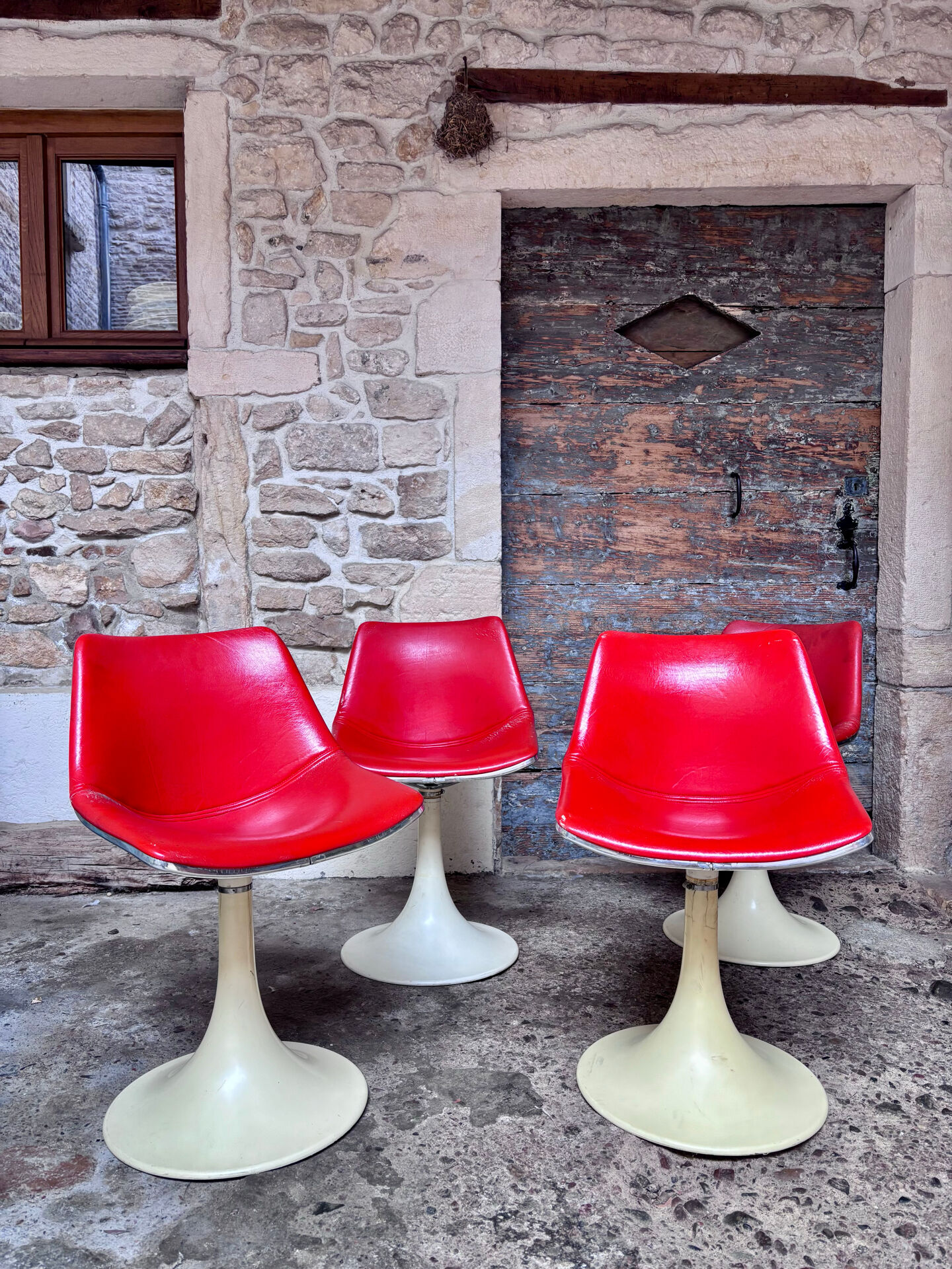 Tulip leg armchairs