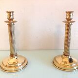 Pair of empire style brass candlesticks