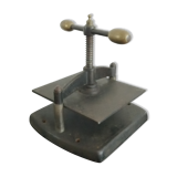 Old press for binding "Ravasse"