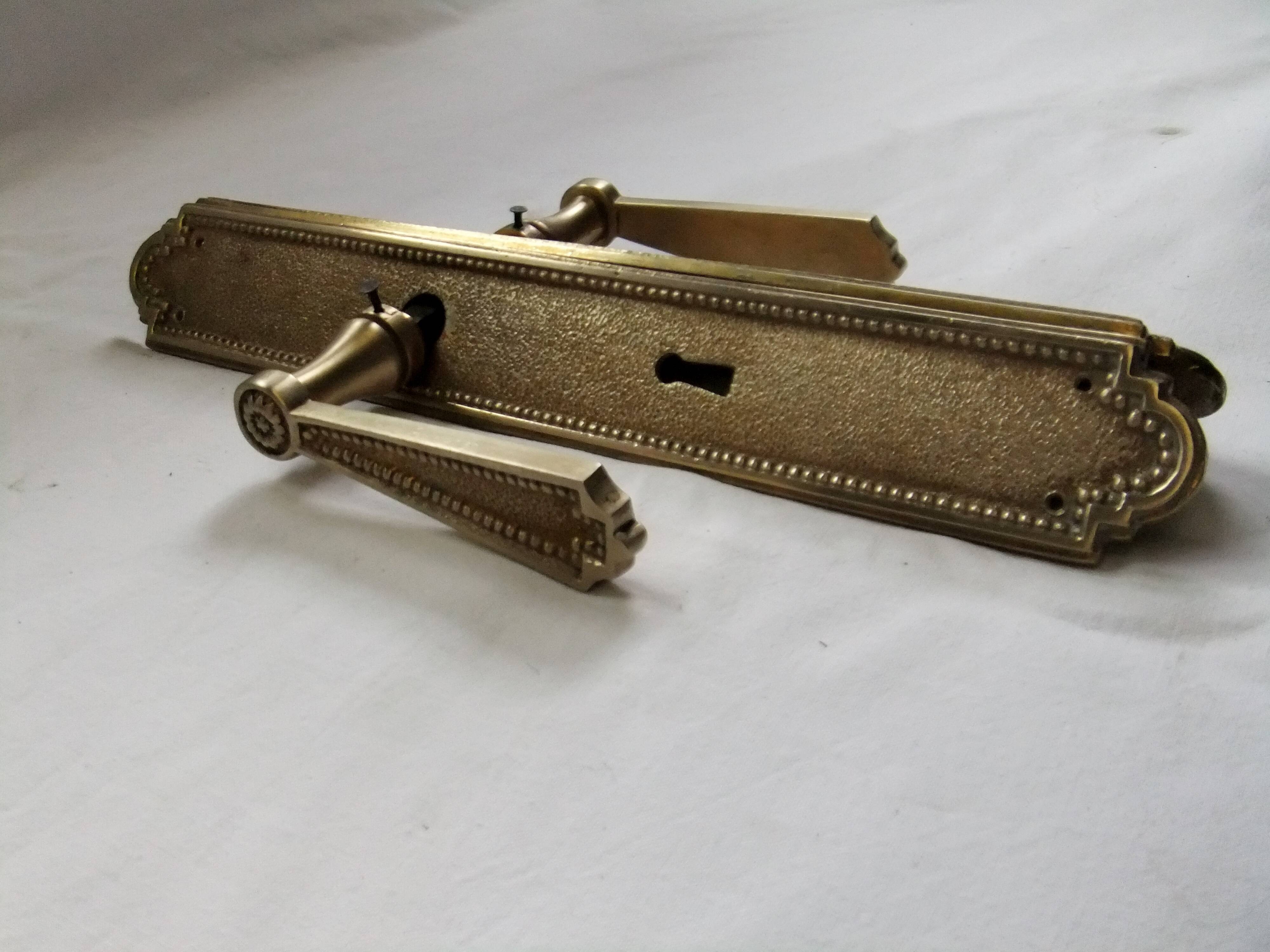 Pair of Louis XVI style beaded bronze door handles