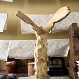 "Winged Victory of Samothrace", beige plaster statuette