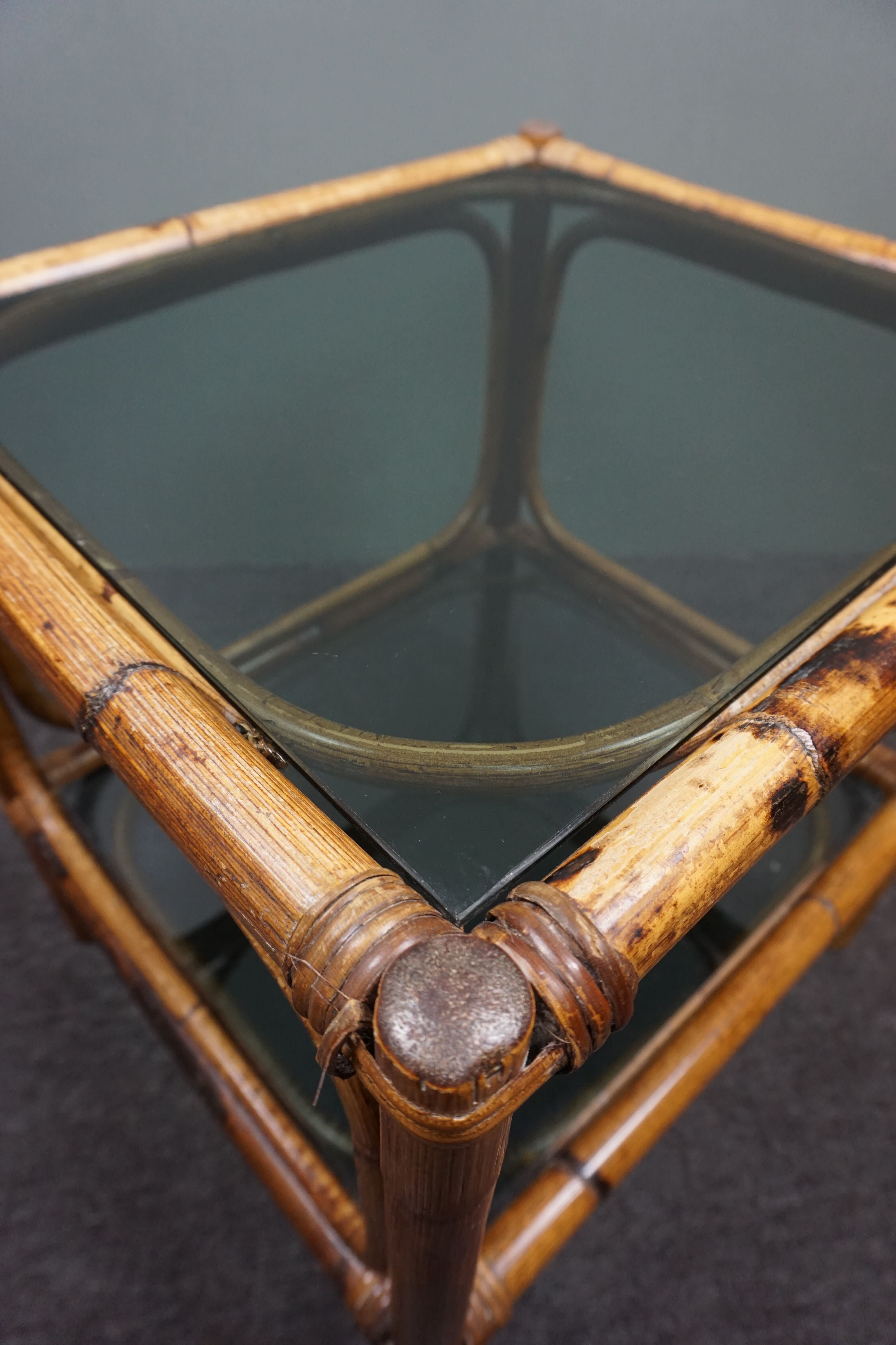 Rattan side table with smoked glass tops