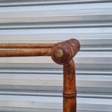 Turned wooden towel rack
